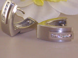 Diamond earrings and pendant jewellery set 0,64ct.